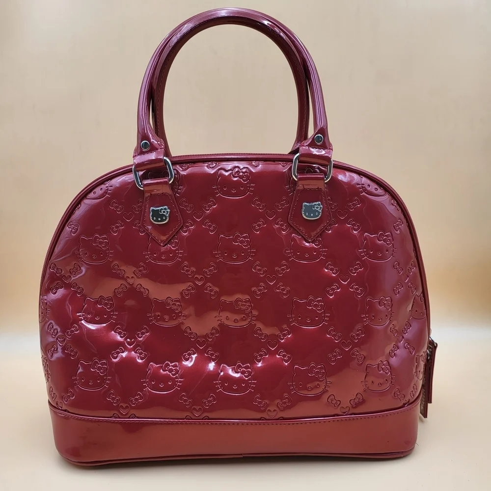 Hello Kitty Red Embossed Satchel with Character Charms..Original..GM size...